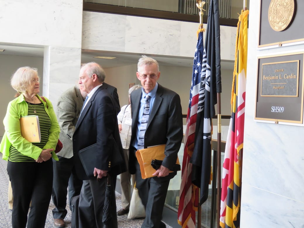Larry Couch entering senator's office